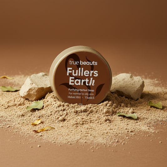 True Beauts Fullers Earth purifying herbal soap on earth tone background with clay and leaves
