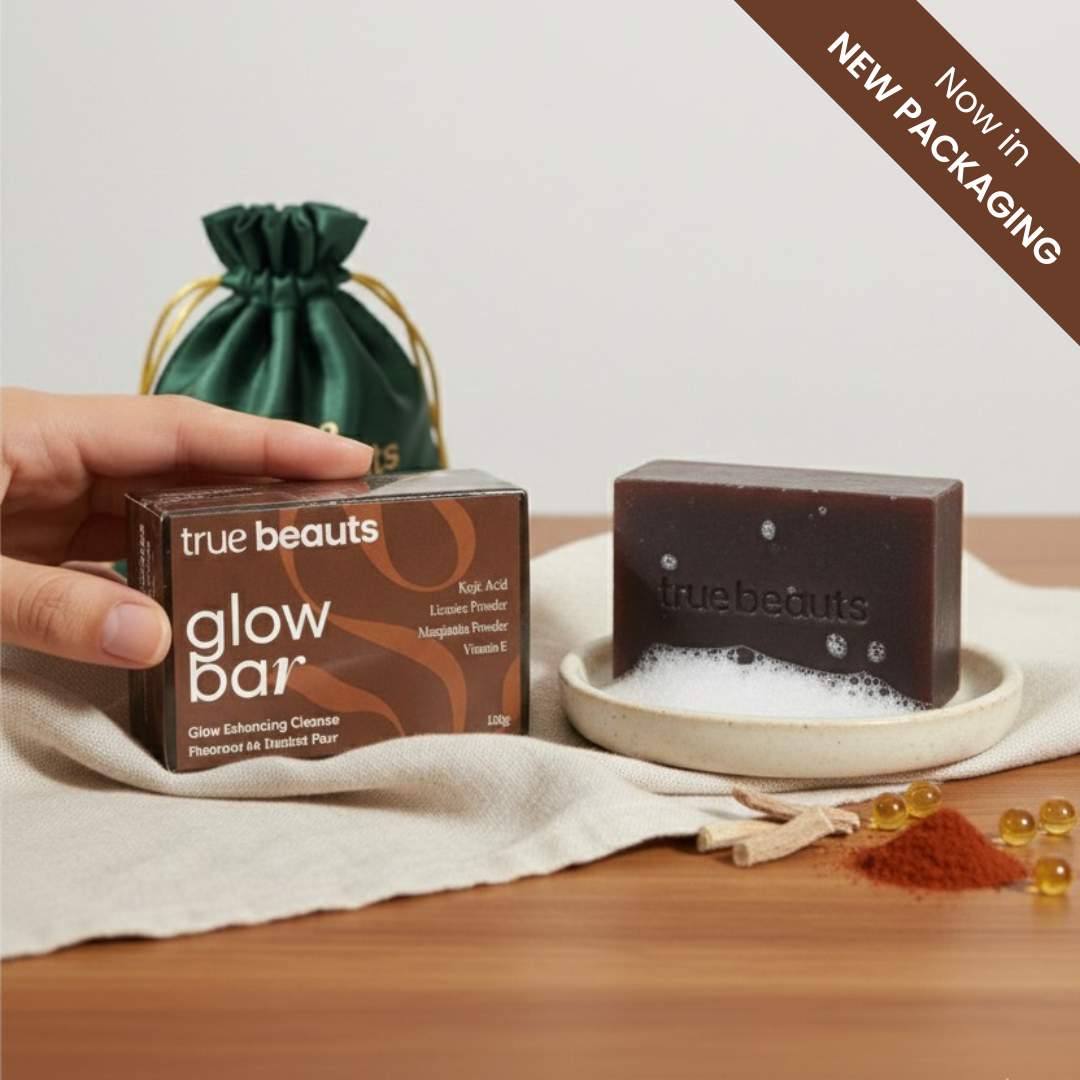 True Beauts glow bar soap with new packaging, featuring natural ingredients on wooden surface